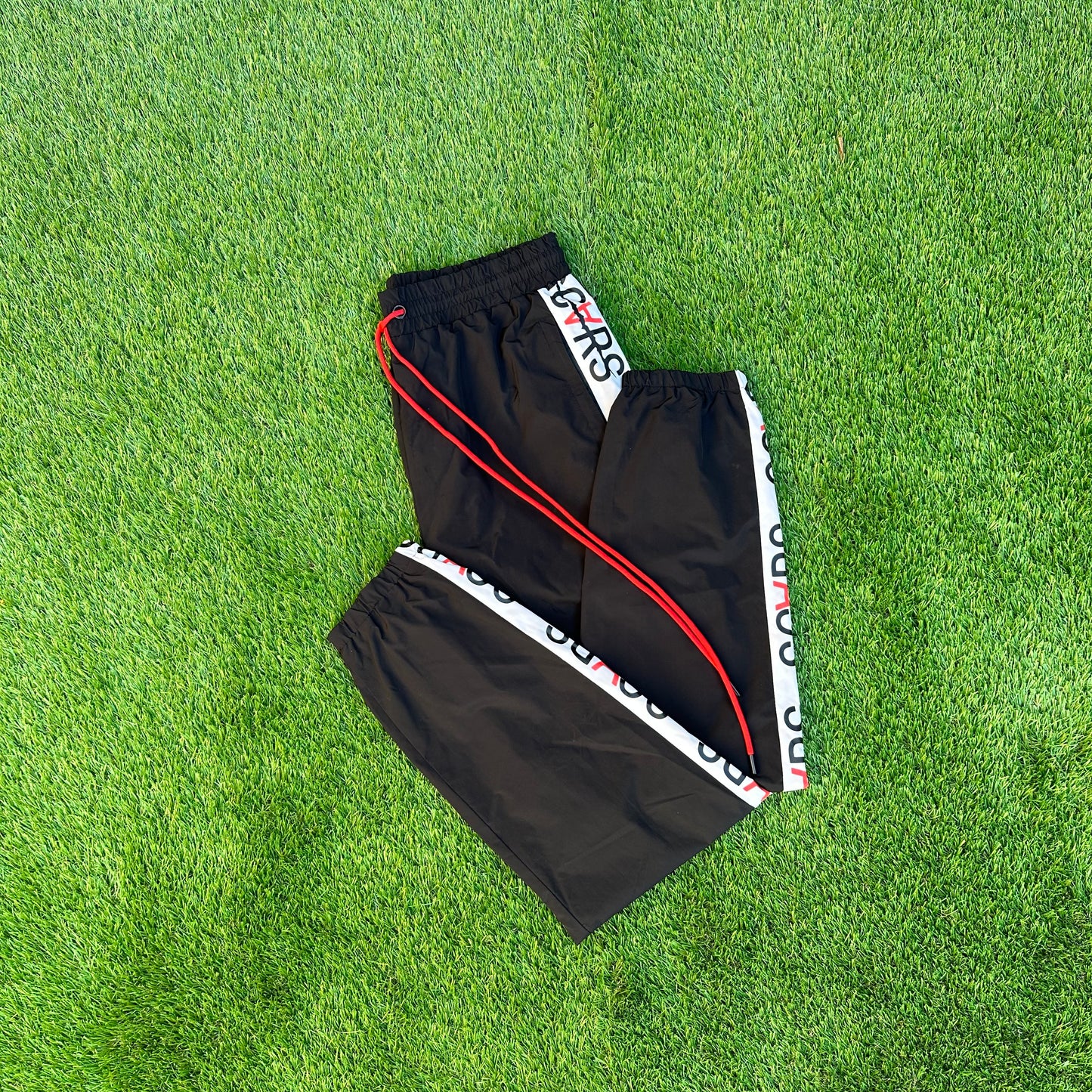 HELLA SCARS TRACK PANTS